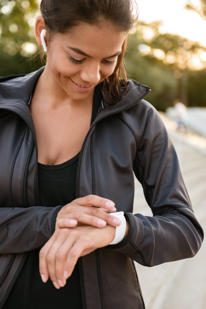 Runner checking her watch